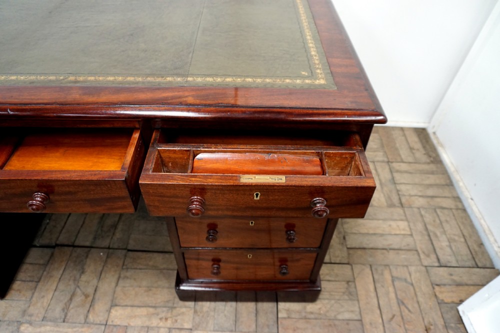 A superb Victorian mahogany pedastal desk View IV