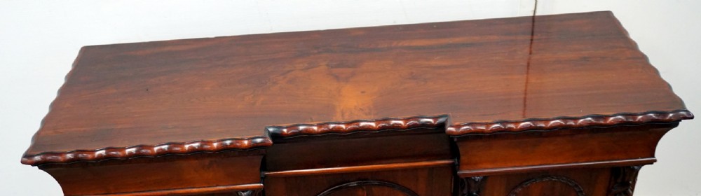 A petite rosewood inverted breakfront chiffonier  View II
