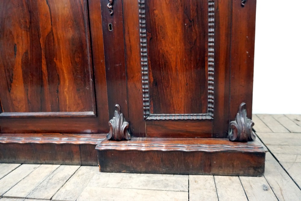 A petite rosewood inverted breakfront chiffonier  View IX