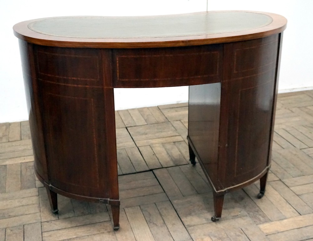 An outstanding quality kidney shaped desk  View IX