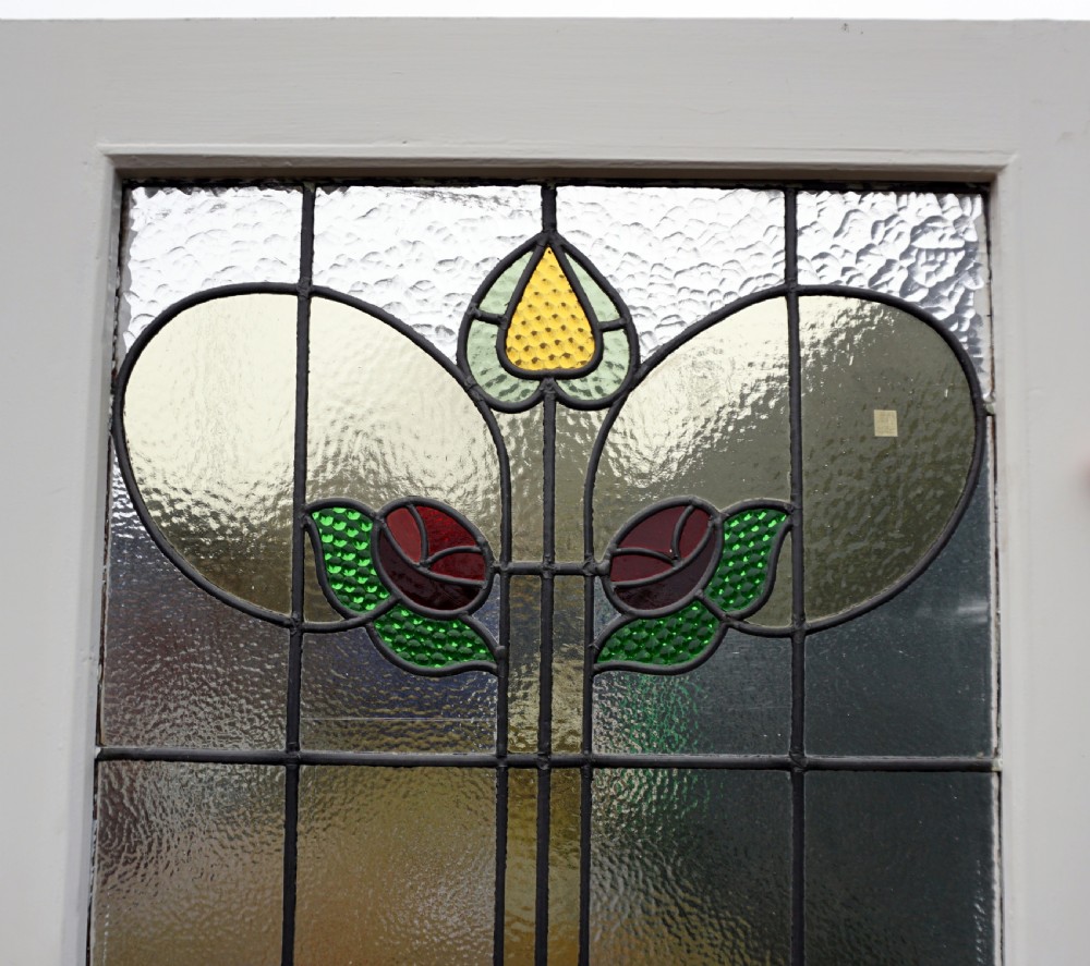 A very good leaded glass door with rose design  View V