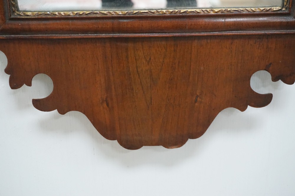 A good Chippendale style Georgian walnut mirror View III