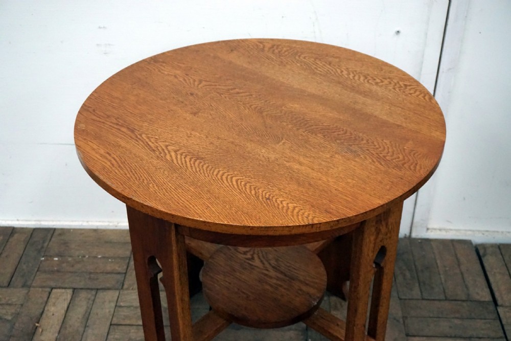 A good solid oak arts and crafts circular occasional table View III