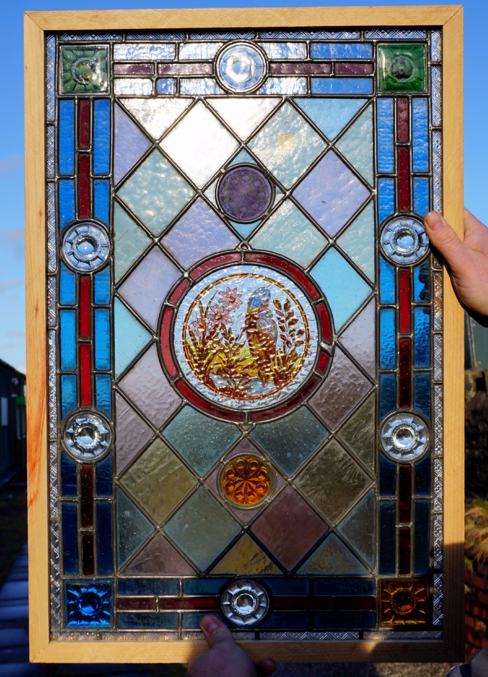 A fantastic painted leaded glass bird window View II