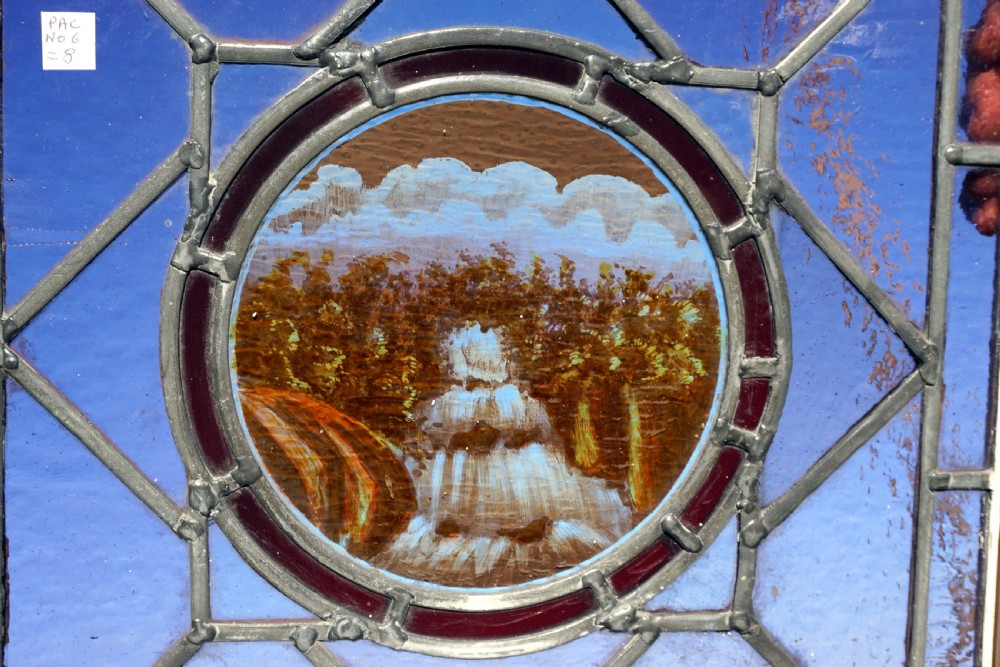 A painted leaded glass window of a Waterfall View II