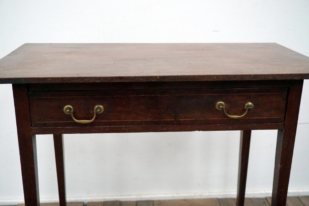 A charming George 111 solid mahogany side table with drawer View II