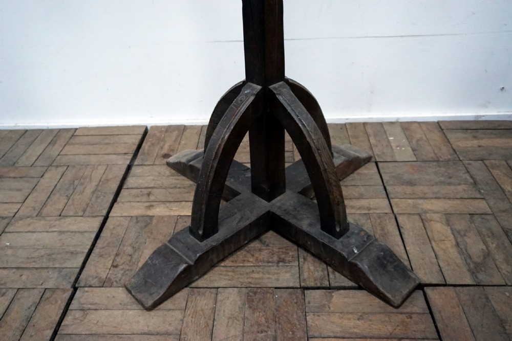 A very unusual arts and crafts solid oak double sided coat stand  View III