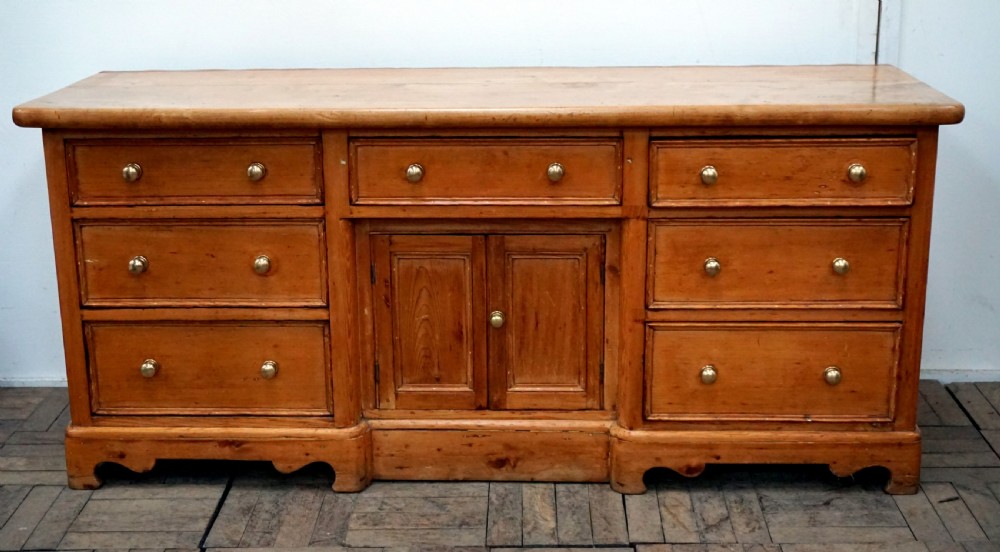 A good sycamore topped traditional pine dresser base