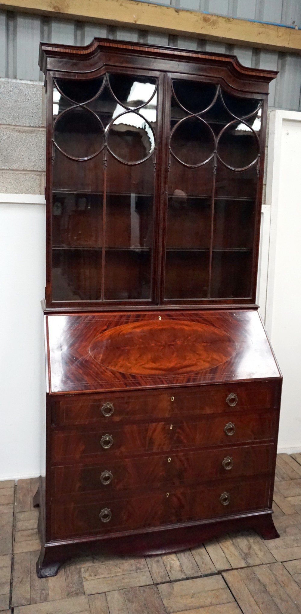 A fine inlaid Edwardian mahogany bureau bookcase