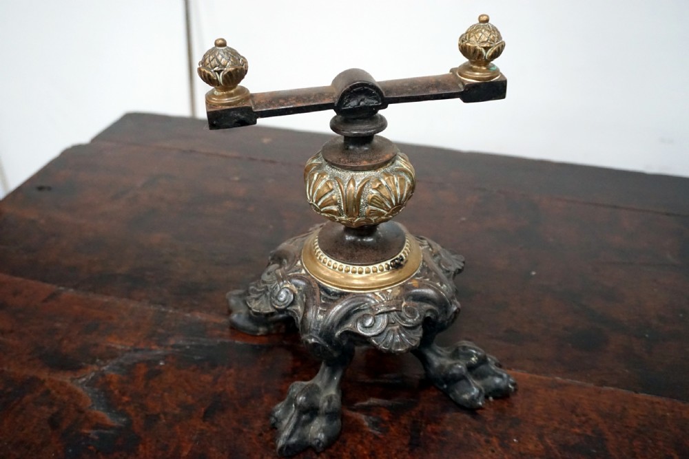 A superb pair of early Victorian bronze and cast iron andirons  View II