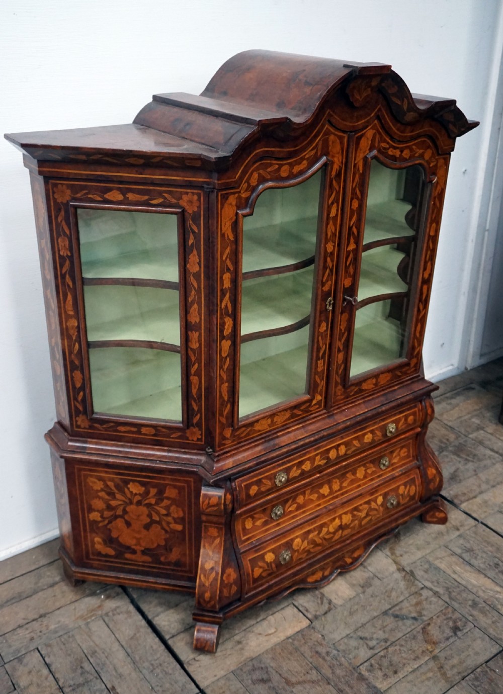 A fantastic miniature Dutch marquetry inlaid cabinet on chest View II