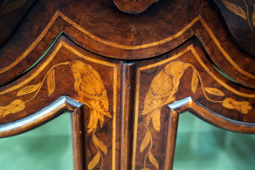 A fantastic miniature Dutch marquetry inlaid cabinet on chest View V