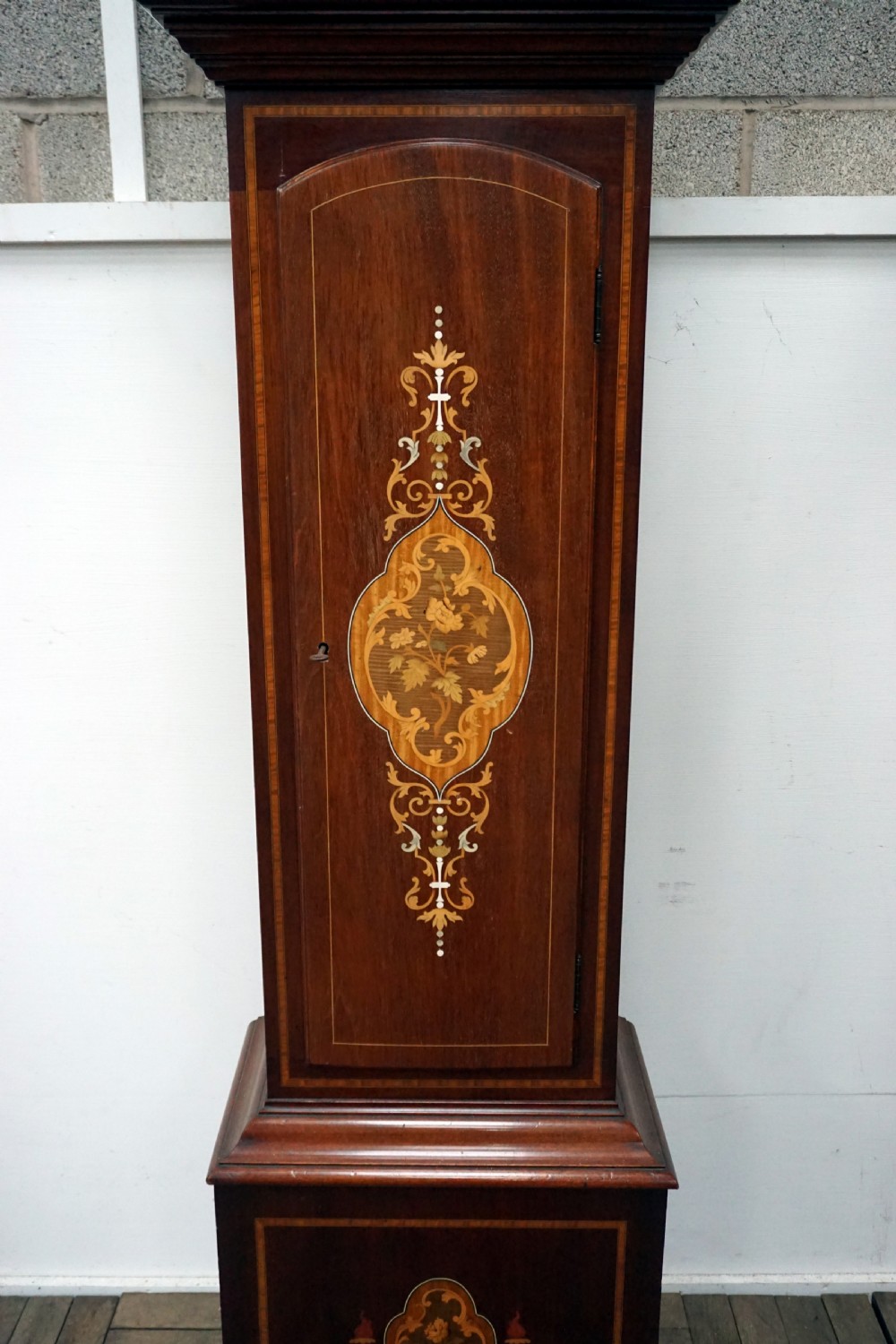 A good 3 train inlaid Edwardian mahogany Grandfather clock View II