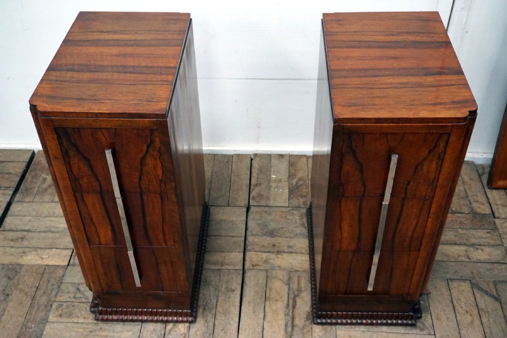 A pair of walnut deco bedside chests View II
