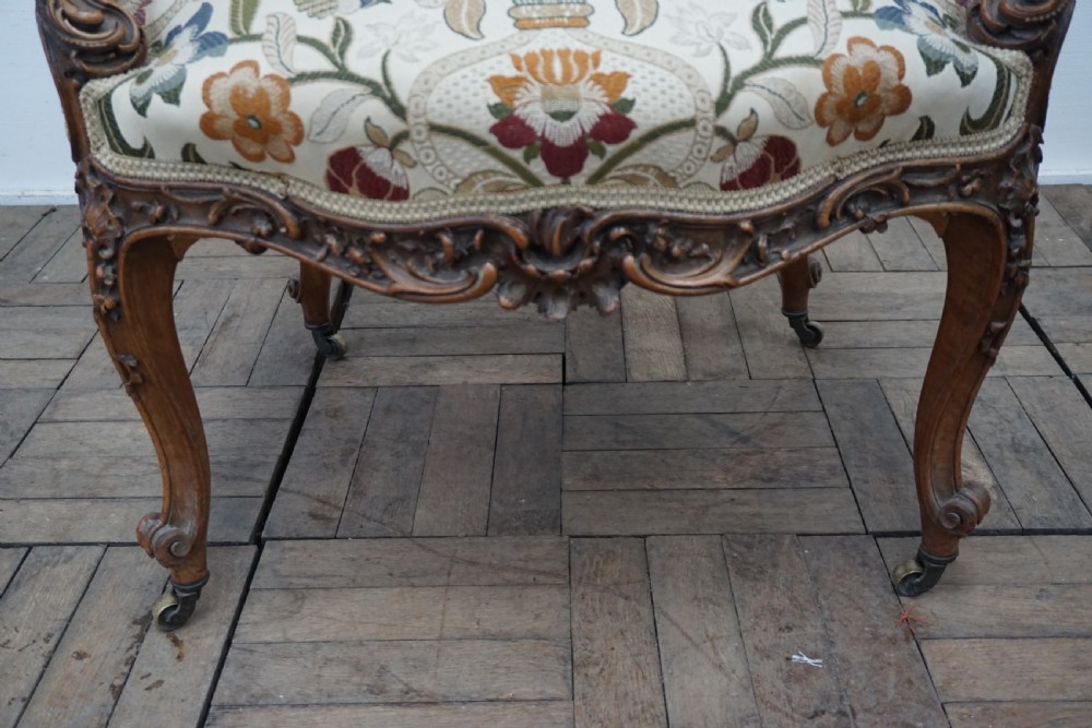 An exceptionally well carved English open armchair  View II