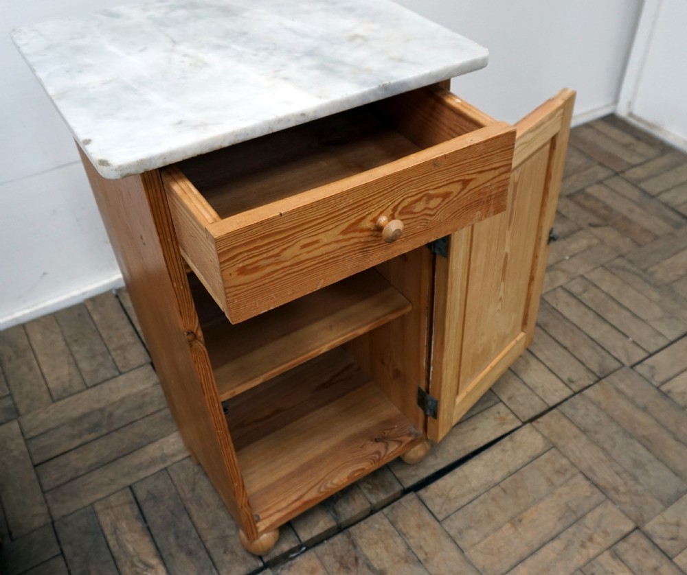 A pair of continental marble top pine bedside cabinets View V