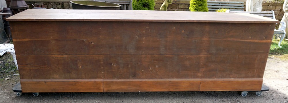A solid oak French shop counter of impressive proportions View III