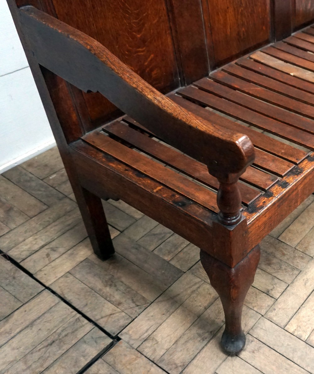 A small sized oak panelled Georgian settle View III