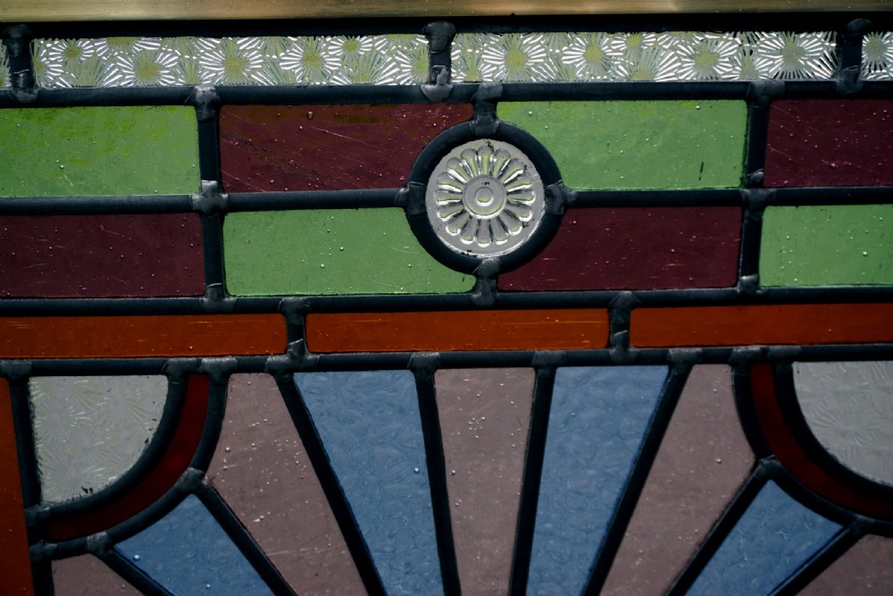 A good late Victorian leaded glass and brass fire screen View V