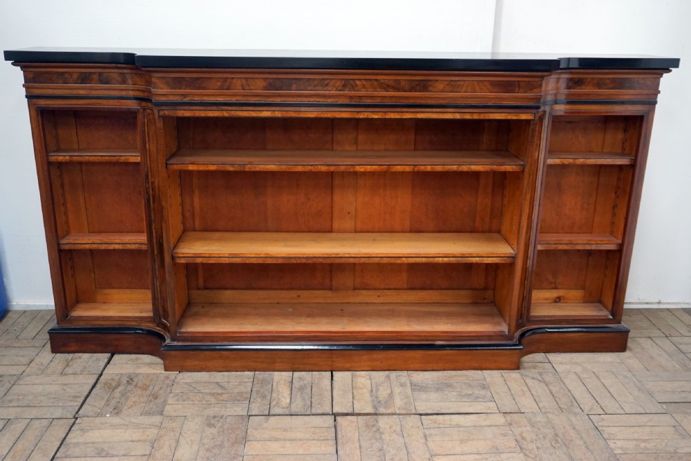 A magnificent narrow Victorian walnut and ebonised open shelf bookcase View II