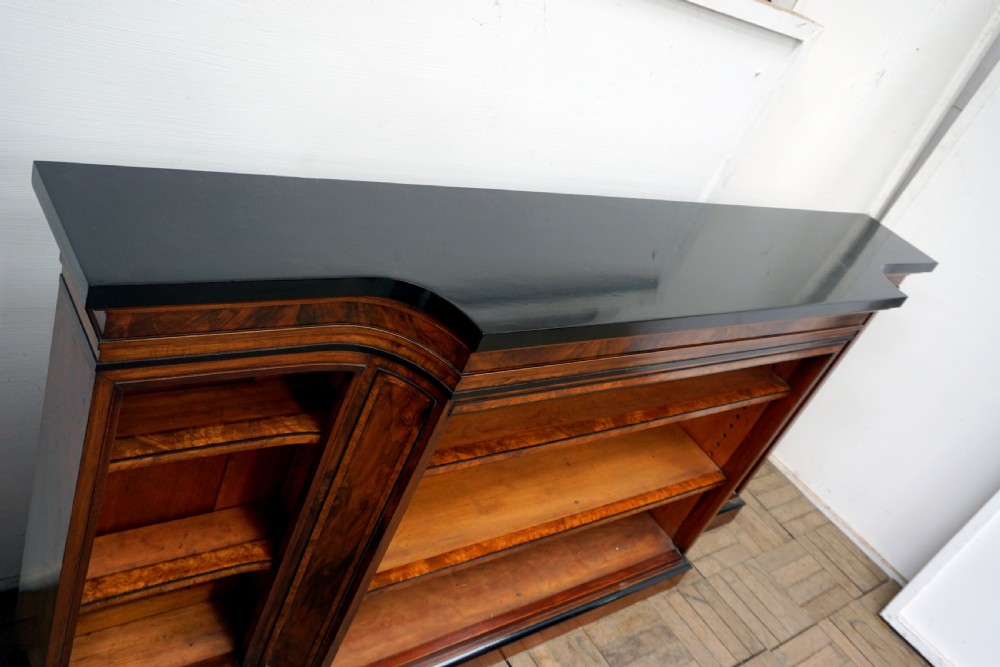 A magnificent narrow Victorian walnut and ebonised open shelf bookcase View VI