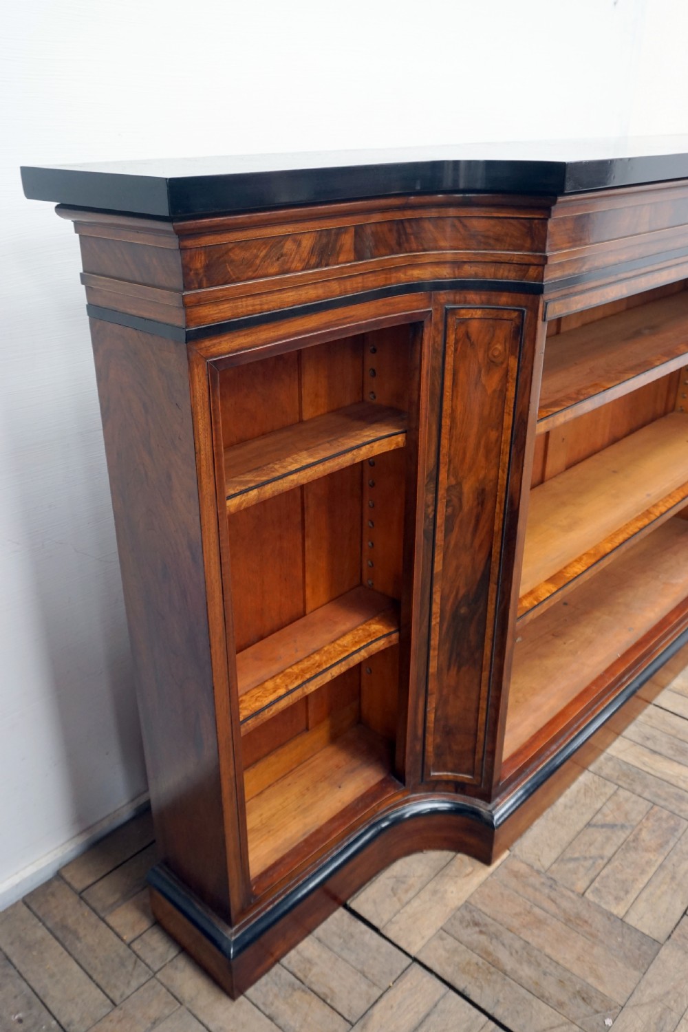 A magnificent narrow Victorian walnut and ebonised open shelf bookcase View VII
