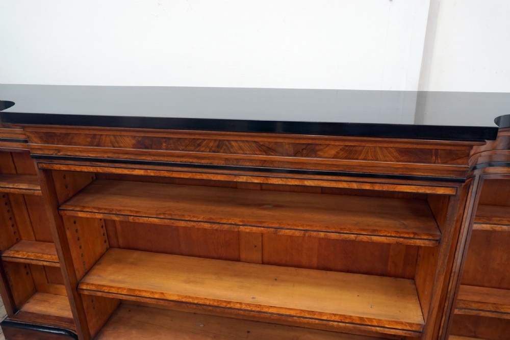 A magnificent narrow Victorian walnut and ebonised open shelf bookcase View IX