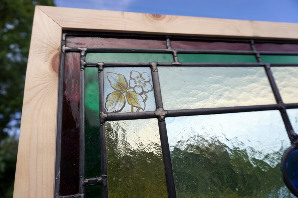A stunning painted leaded glass bird window View II