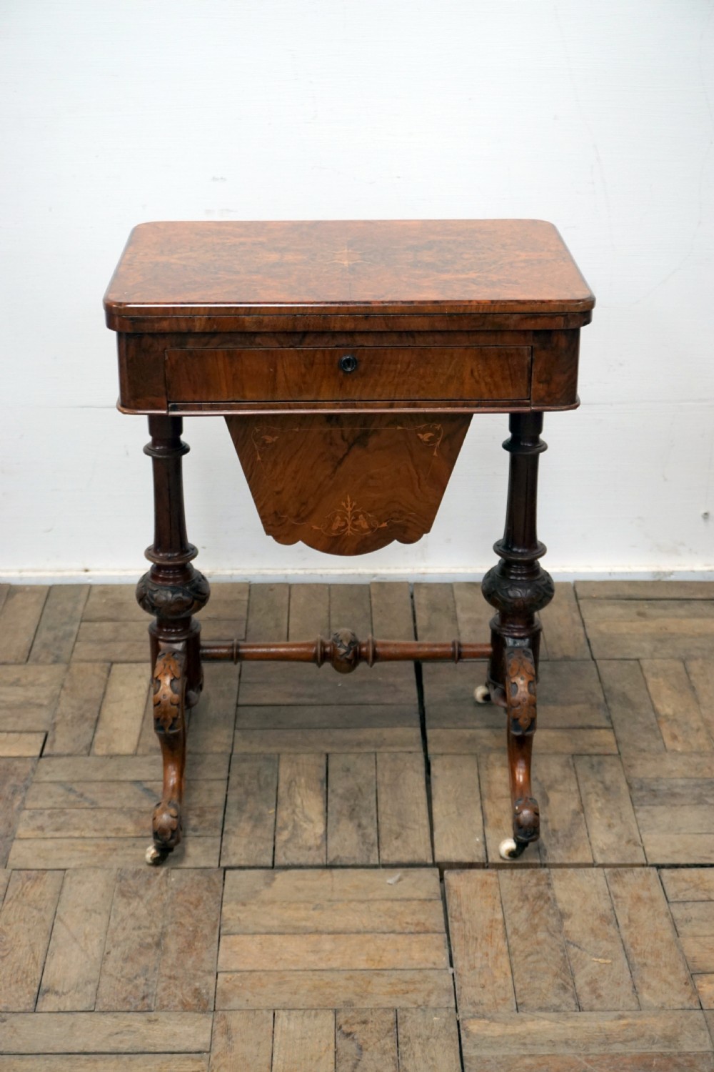 A good Victorian burr walnut games compendium and sewing box