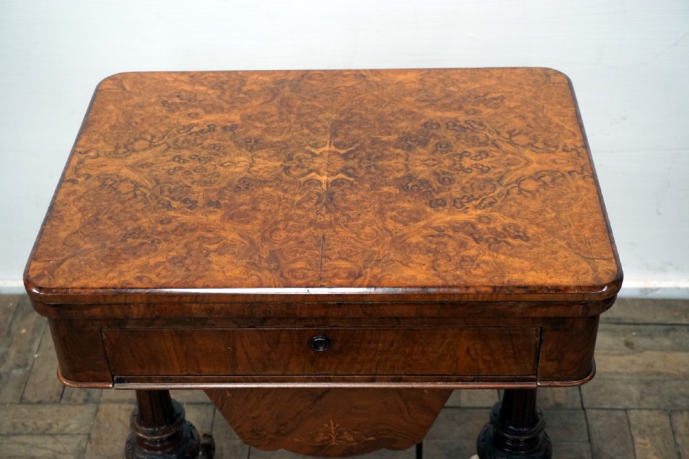 A good Victorian burr walnut games compendium and sewing box View II