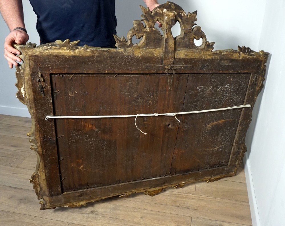 A very good carved wood and gilded mirror View IX