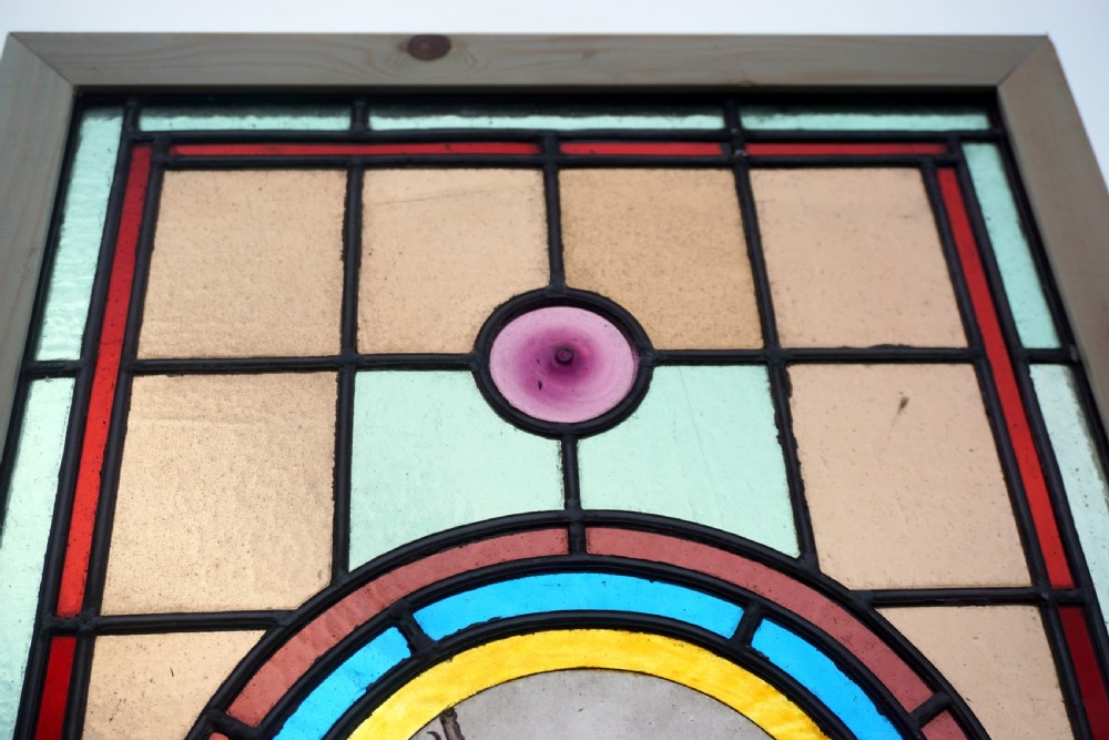 A beautiful stained glass painted bird window View III