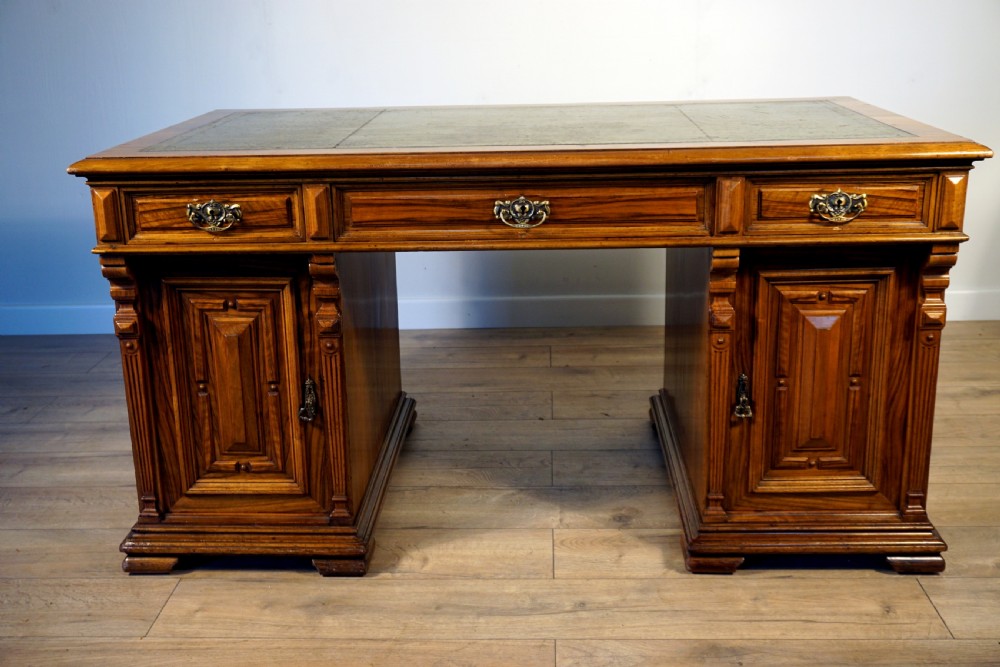 An outstanding walnut English Victorian pedastal desk by Howard and Son View II