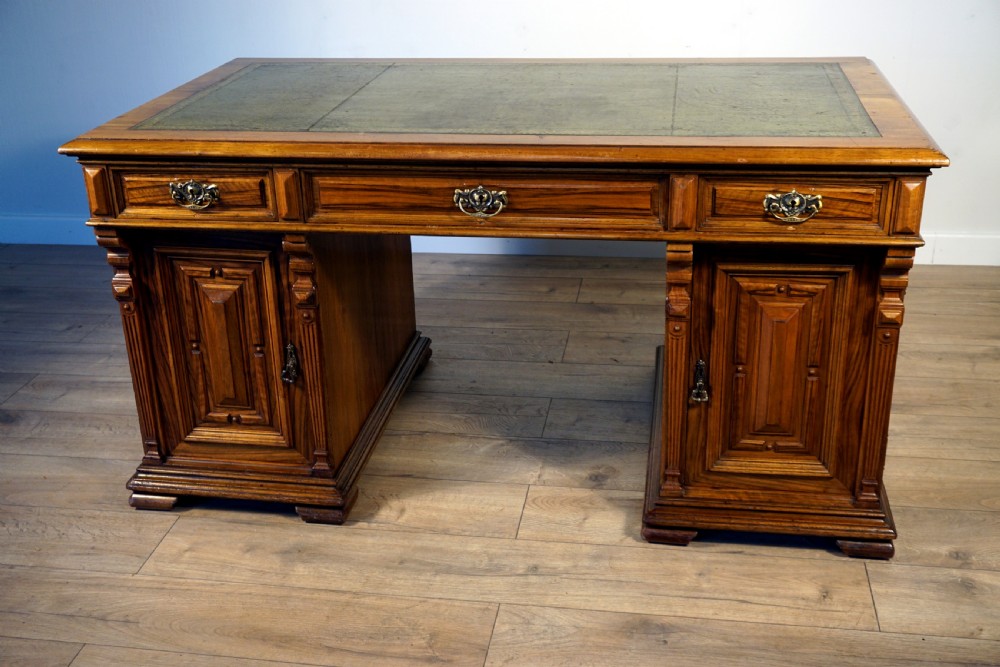 An outstanding walnut English Victorian pedastal desk by Howard and Son View III