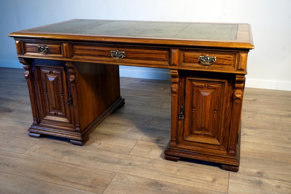An outstanding walnut English Victorian pedastal desk by Howard and Son View IV