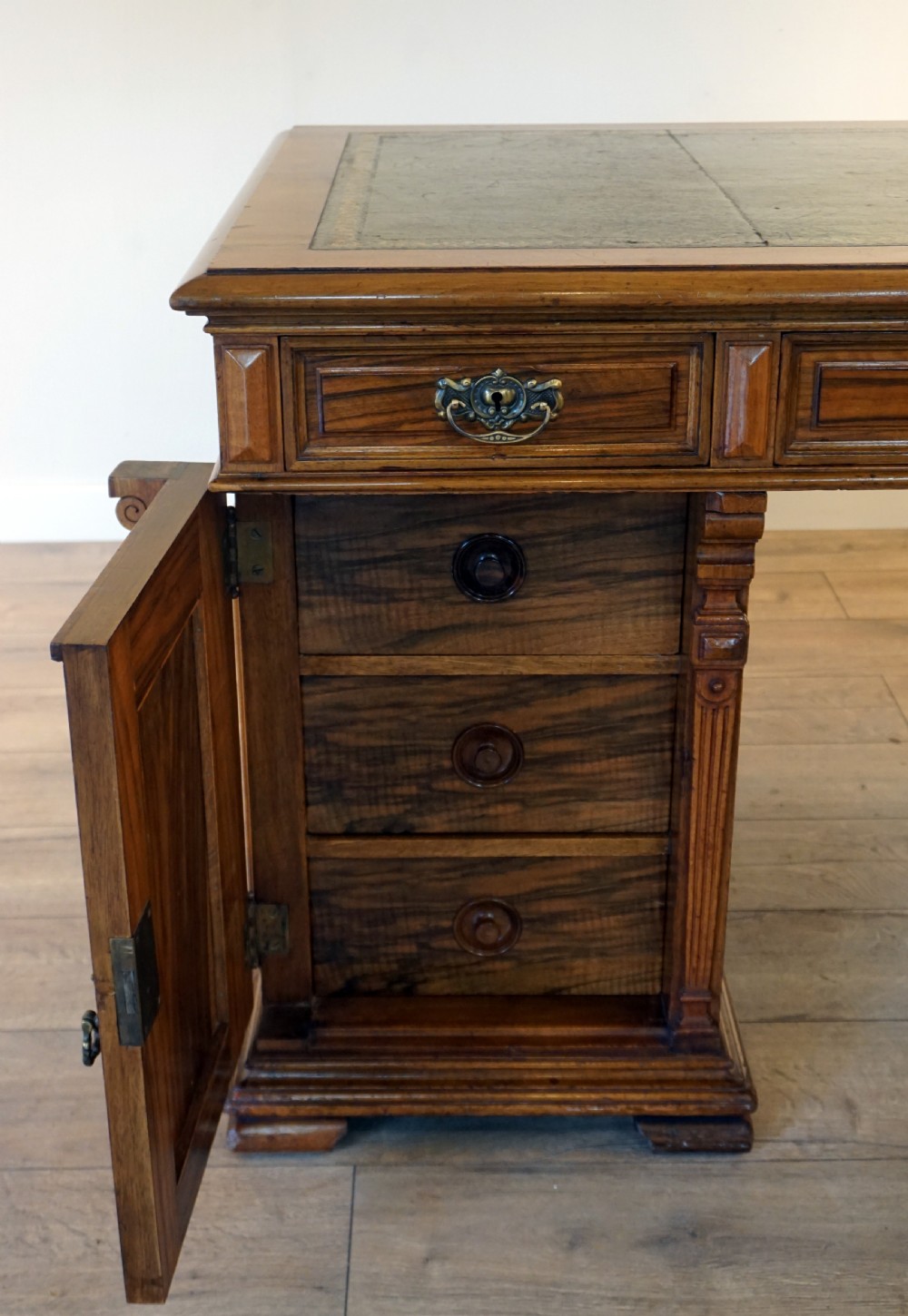An outstanding walnut English Victorian pedastal desk by Howard and Son View X