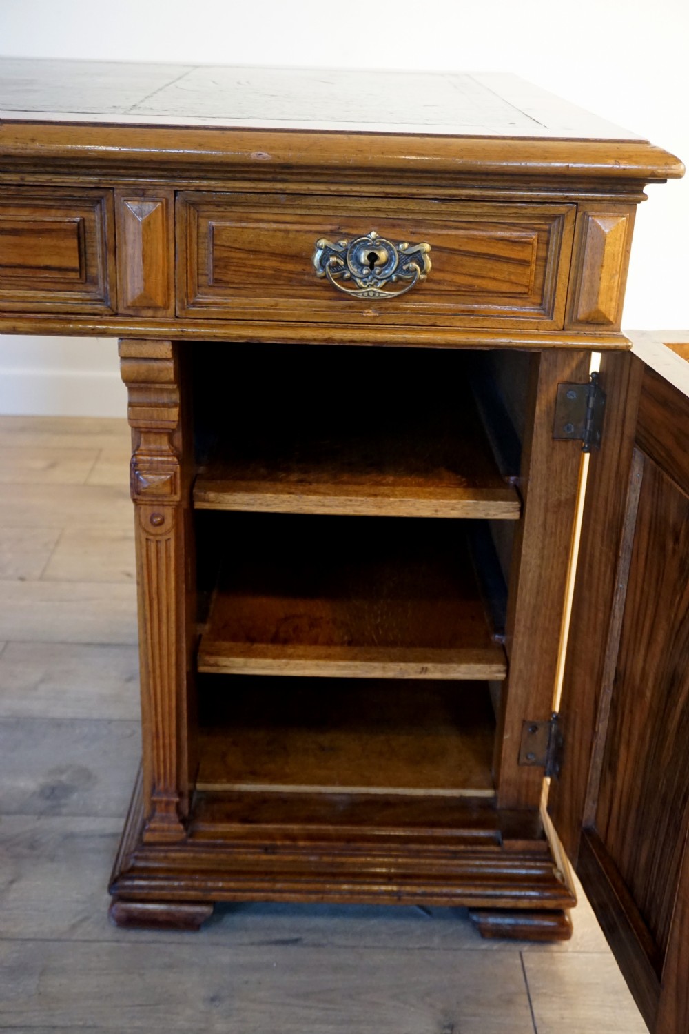 An outstanding walnut English Victorian pedastal desk by Howard and Son View XI