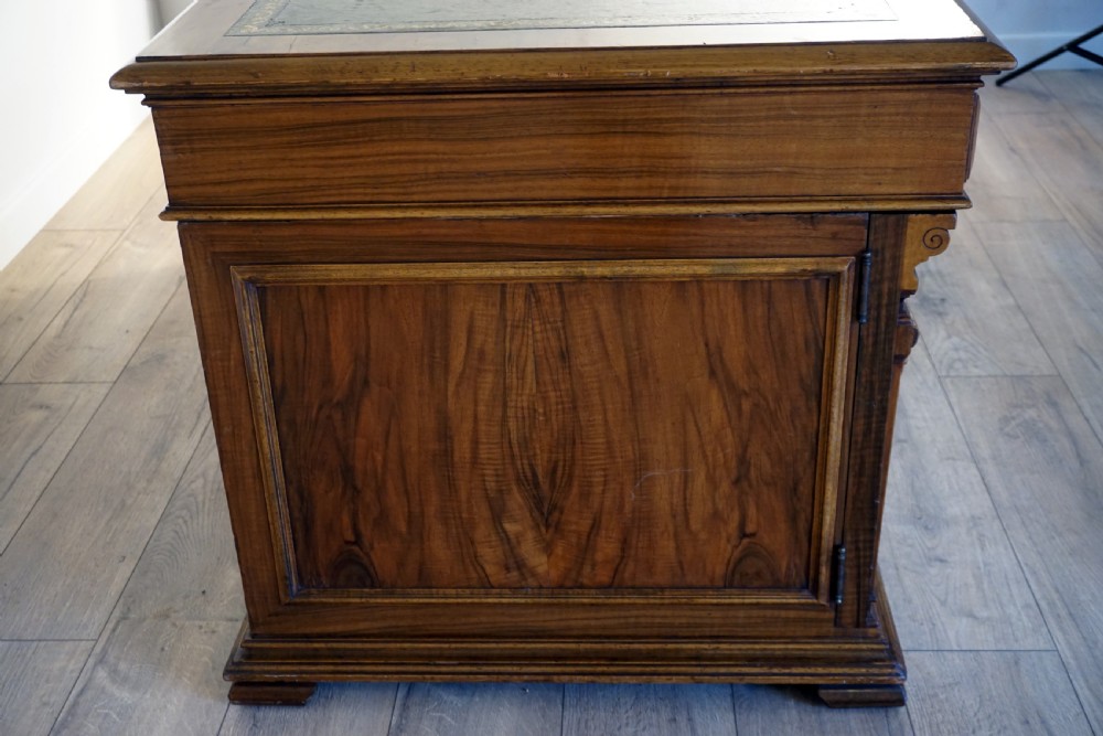An outstanding walnut English Victorian pedastal desk by Howard and Son View XIII