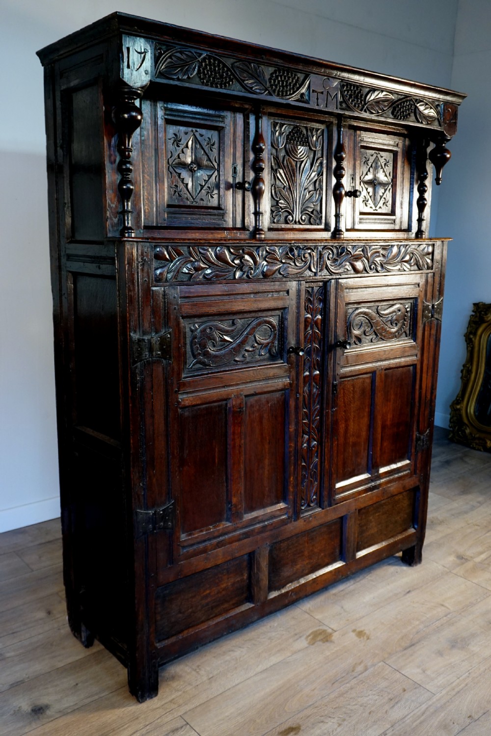 A charming original narrow oak carved court cupboard  View VII