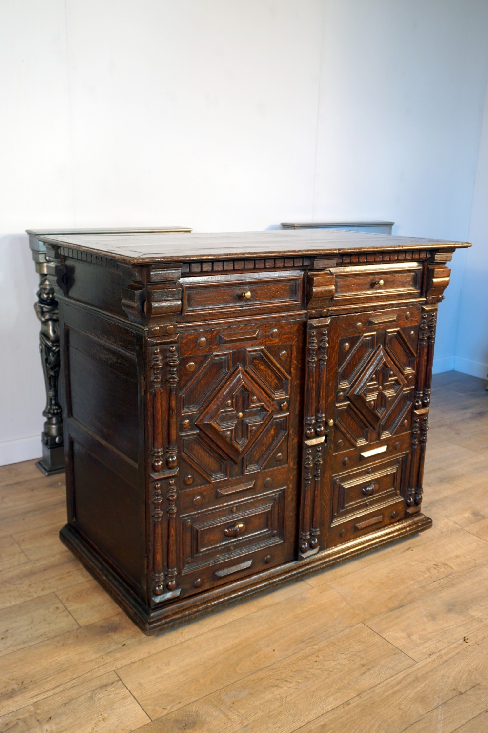 An exceptional Jaobean enclosed oak chest of drawers View III