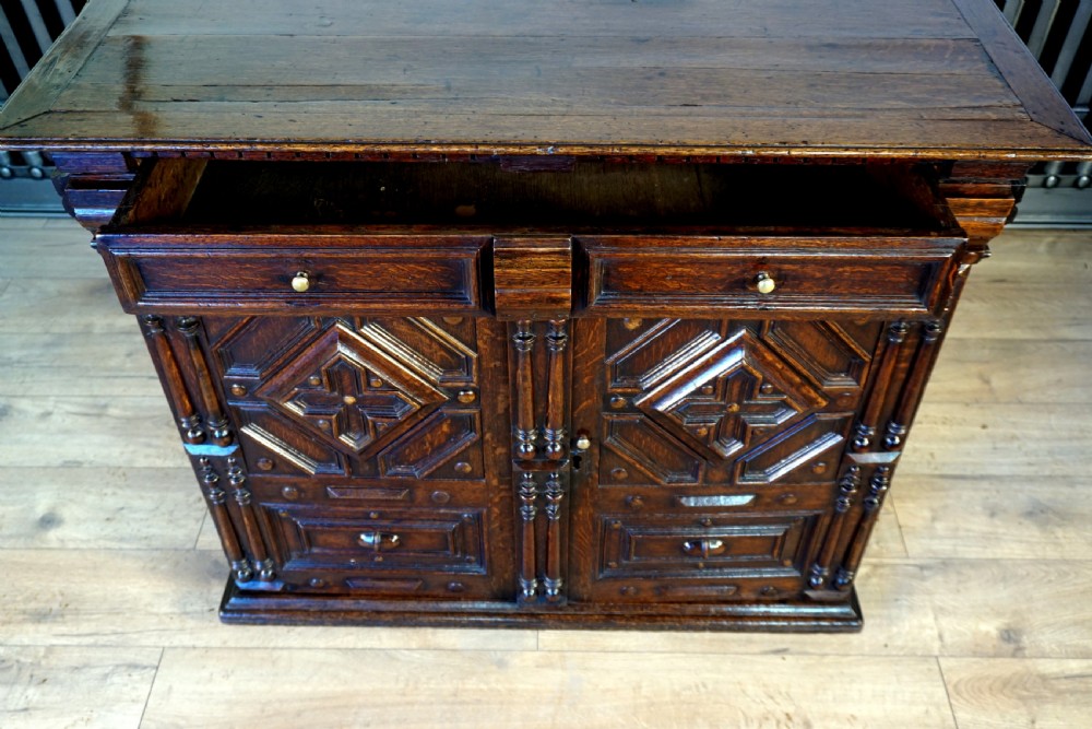 An exceptional Jaobean enclosed oak chest of drawers View V
