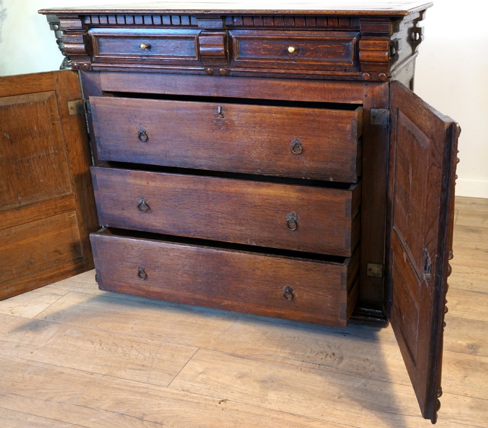 An exceptional Jaobean enclosed oak chest of drawers View VII