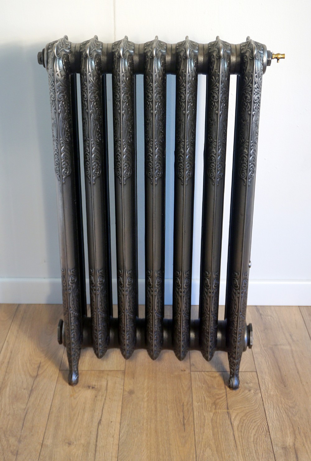A lovely roccoco, Art Nouveau 7 section 19th century polished cast iron radiator View II