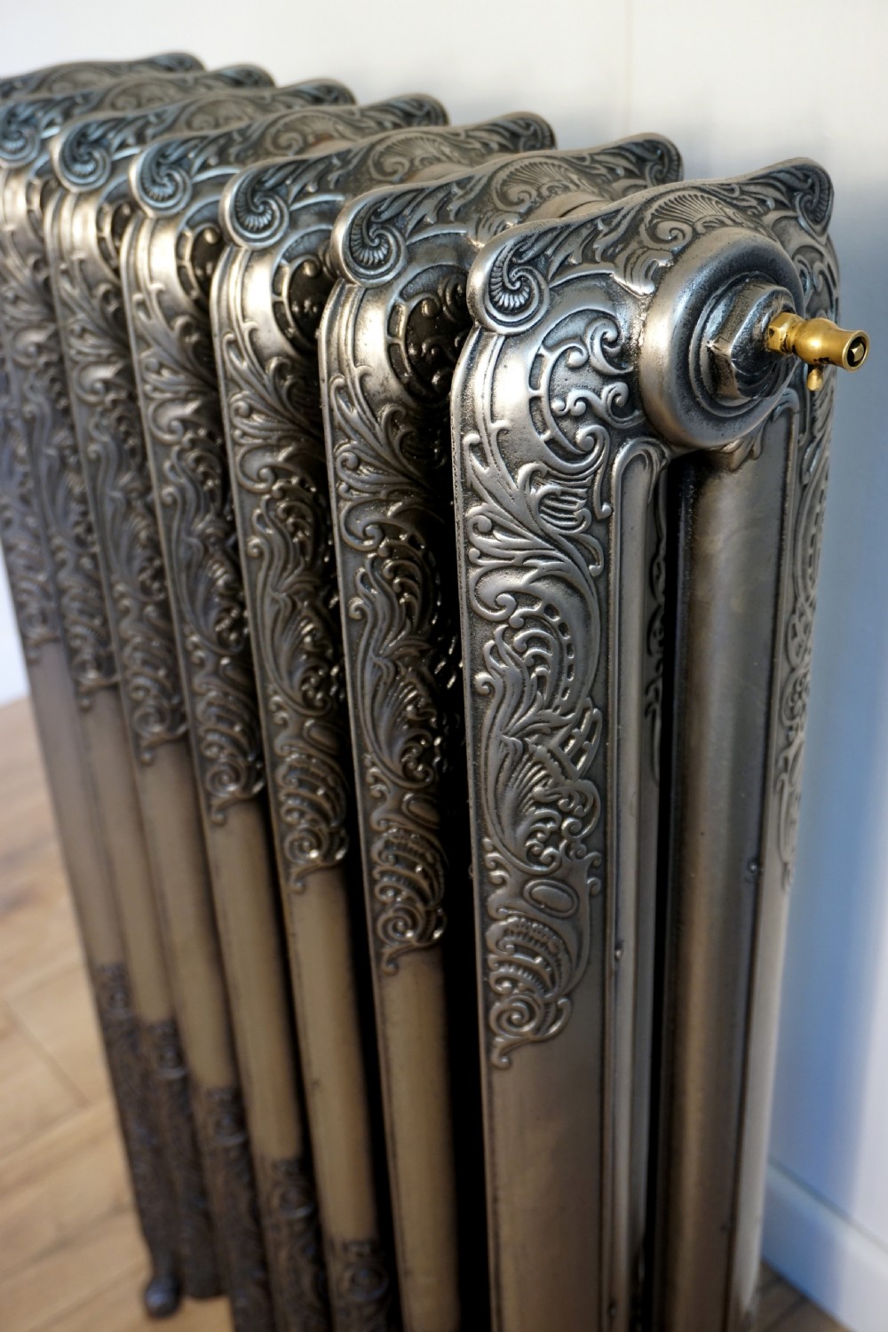 A lovely roccoco, Art Nouveau 7 section 19th century polished cast iron radiator View III