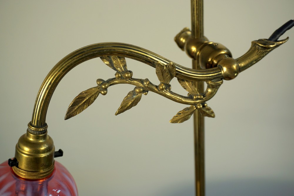 An exceptional early 20th century articulated reading or side lamp View III