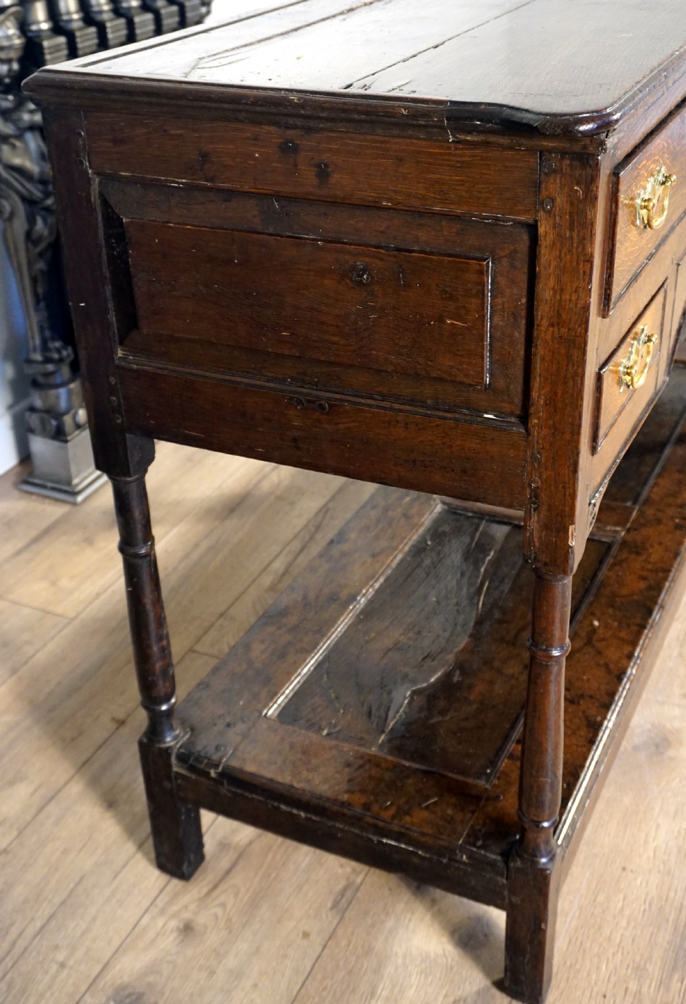 A delightful and unusual well patinated oak Welsh dresser base View III