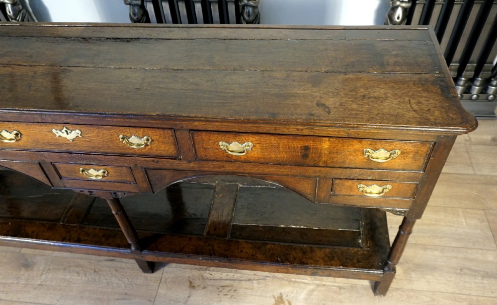 A delightful and unusual well patinated oak Welsh dresser base View V