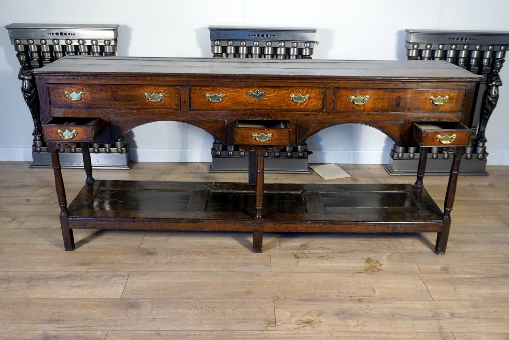 A delightful and unusual well patinated oak Welsh dresser base View VI