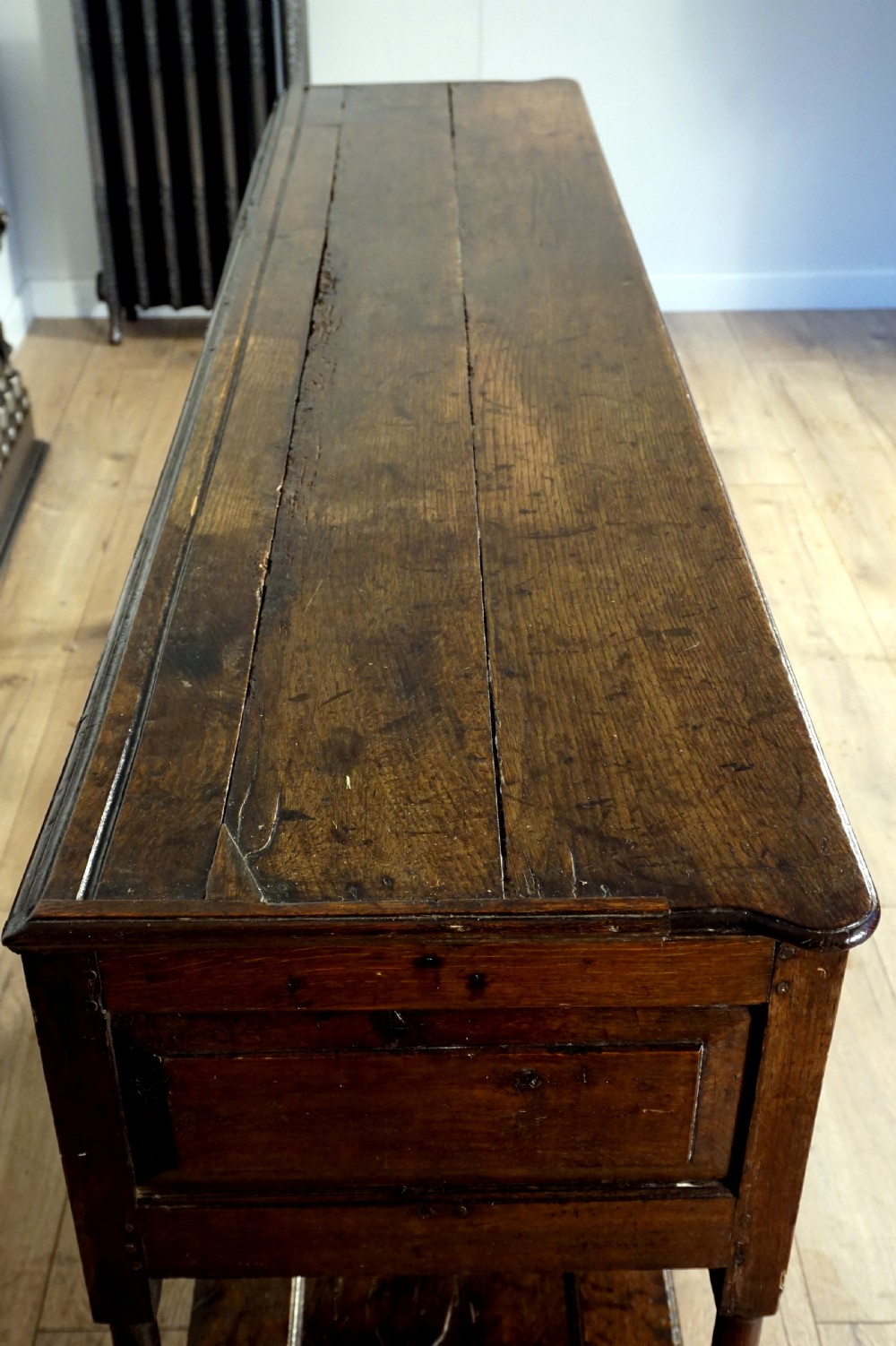 A delightful and unusual well patinated oak Welsh dresser base View VII