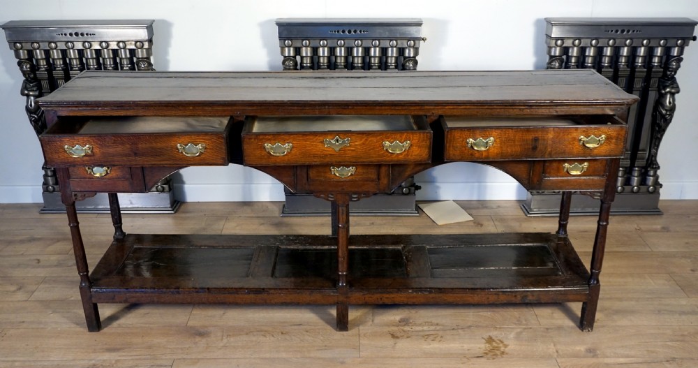 A delightful and unusual well patinated oak Welsh dresser base View VIII